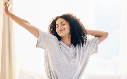 black-woman-morning-stretching-and-waking-up-in-h-2023-11-27-04-57-28-utc.jpg__PID:cceb7964-5739-4e63-898f-45b3f9dcff21