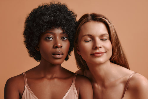 multiethnic-women-on-beige-background
