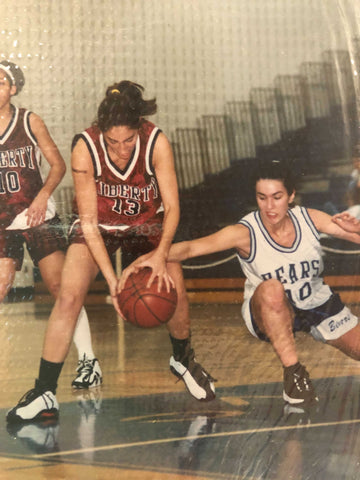 Briar playing basketball in high school