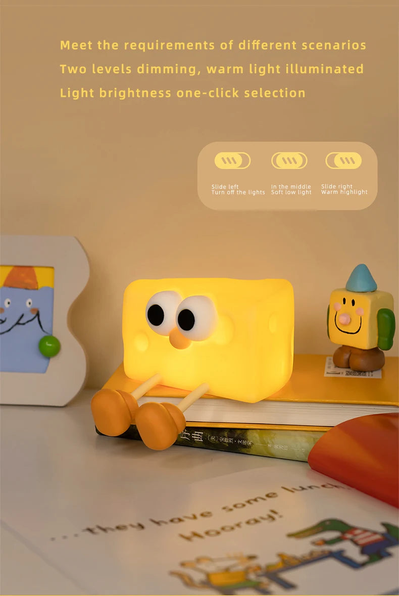 Cheese night light shining brightly in a dark room