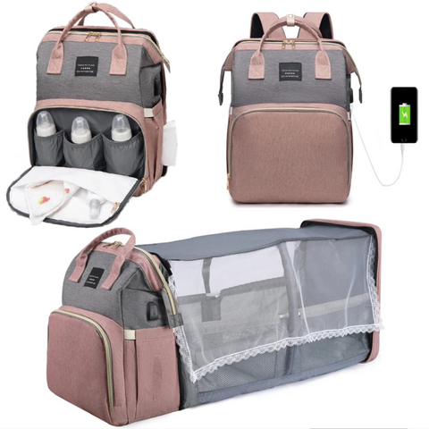 The perfect all in one diaper backpack with travel bassinet, shade cover, insulated bottle slots and more!