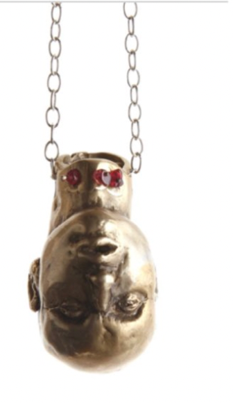 **LARGE HEAD with ruby studded throat on sterling silver chain