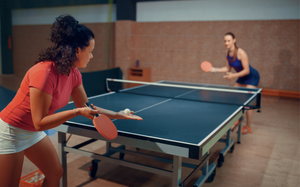 Ladies playing ping pong