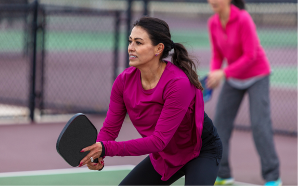 Lady playing pickleball