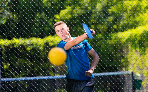 Boy Playing Pickleball