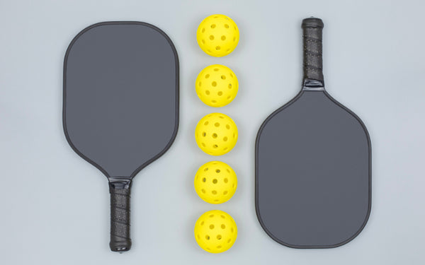 Pickleball paddles and pickleball balls