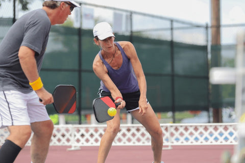 Woman Returning the Service in Pickleball