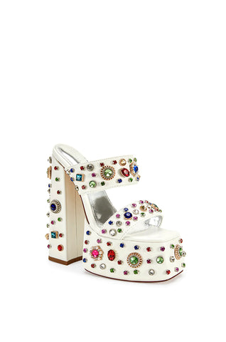white platform slip on heels with colorful rhinestone embellishments