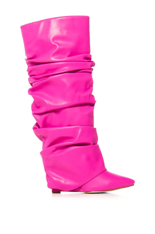 image of pink knee high pointed toe boots with a wedge heel and fold over scrunched fabric silhouette