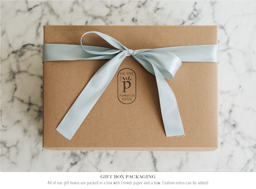 Gift Box Packaging. All of our gift boxes are packed with crinkle paper and a bow, Custom note can be added! Gourmet Popcorn Grand Rapids Michigan Wedding.