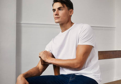 white t-shirt being modelled