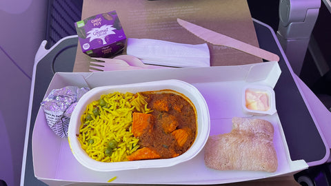 in flight meal of chicken curry and rice