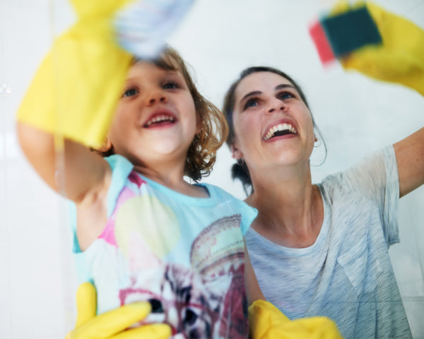 mother and daughter doing chores together