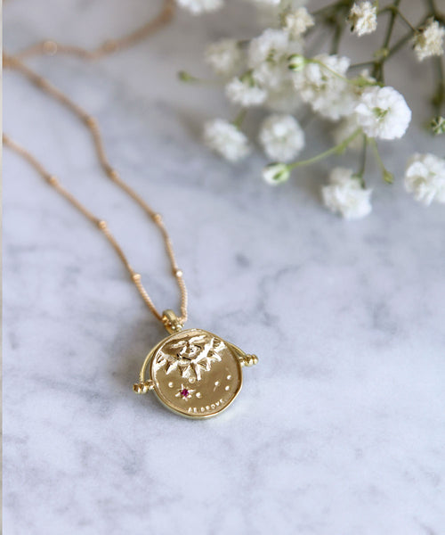 As Above, So Below gold filled spinner necklace.