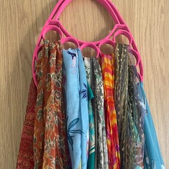 Scarf hanger filled with scarves