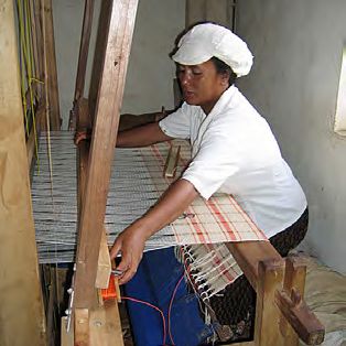 Madagascan woman using a loom