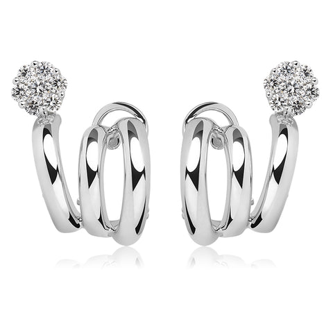 white gold diamond stud earrings by hueb