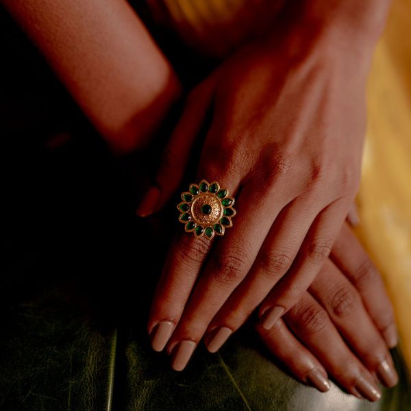 green stone studded ring