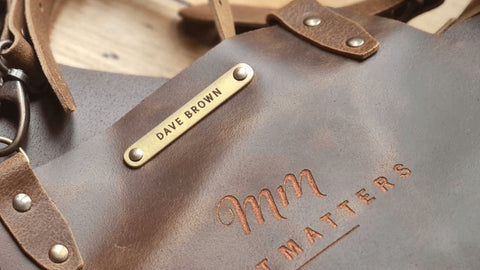 Leather apron engraving metal tag