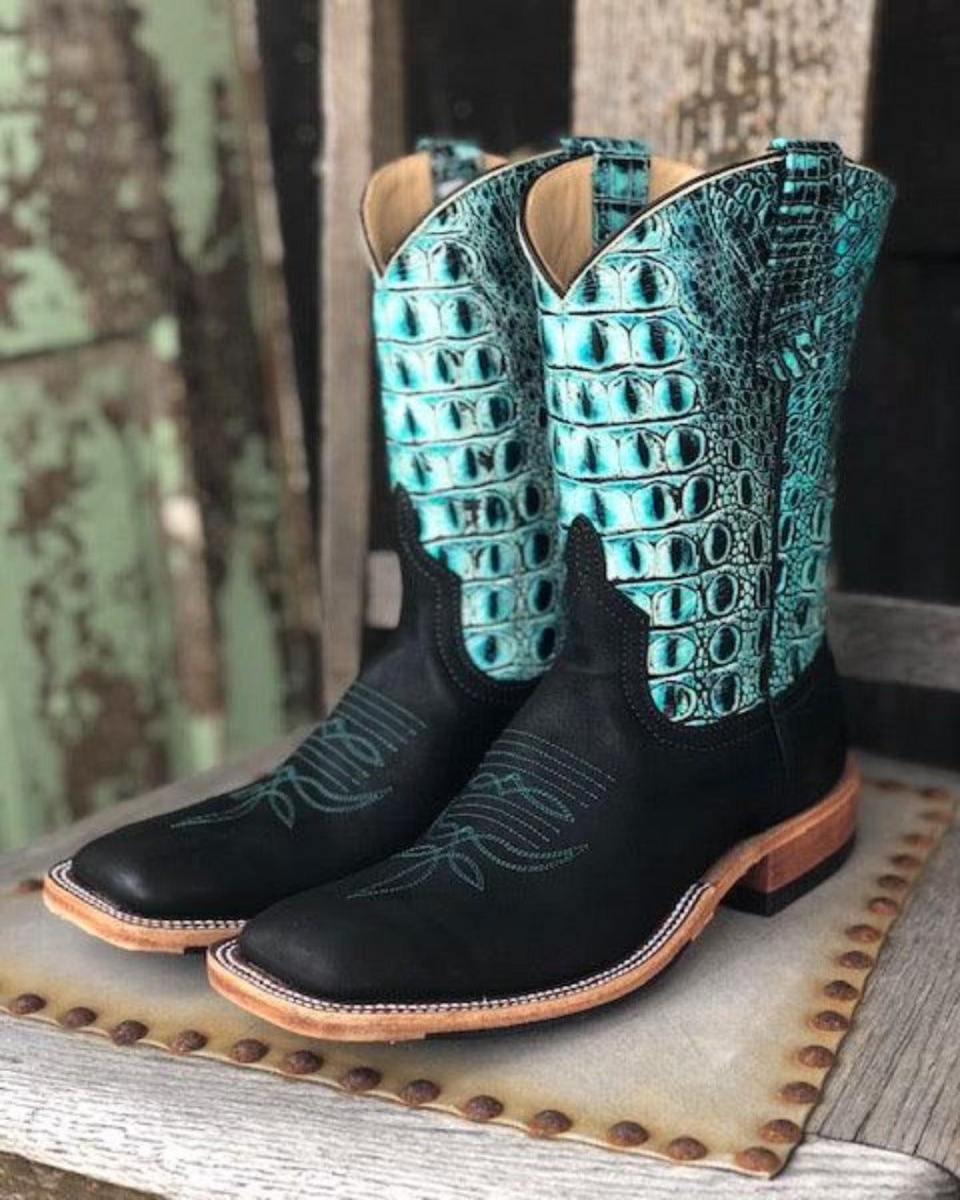 black and turquoise cowboy boots