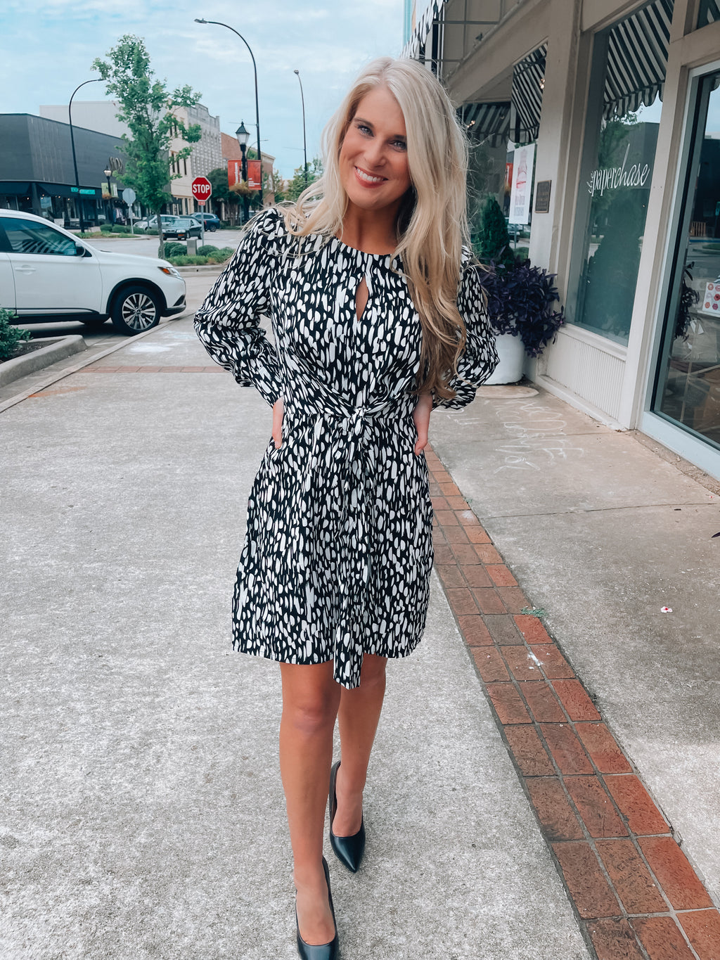 Dress features a black base, white abstract printed detail, long ...