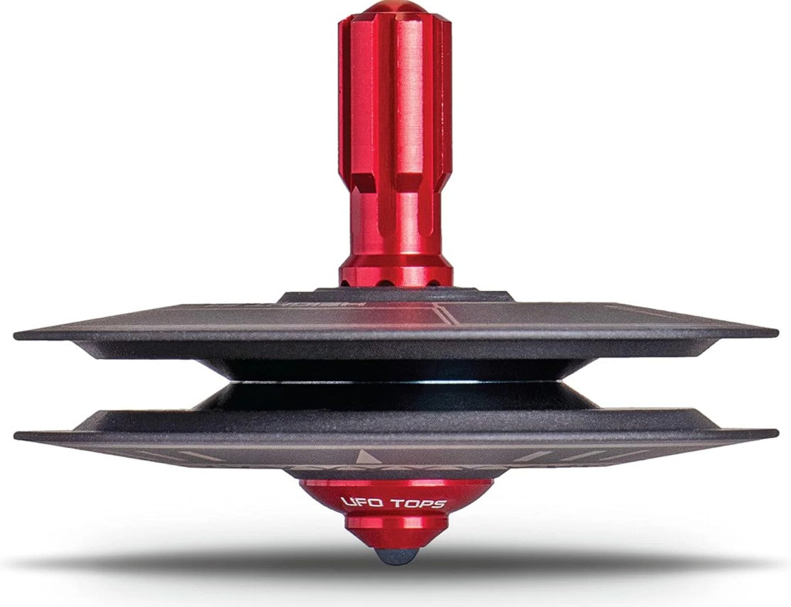Height 611 spinning top with red detailing on display