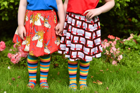 Twins in Polly & Andy knee high rainbow stripes 