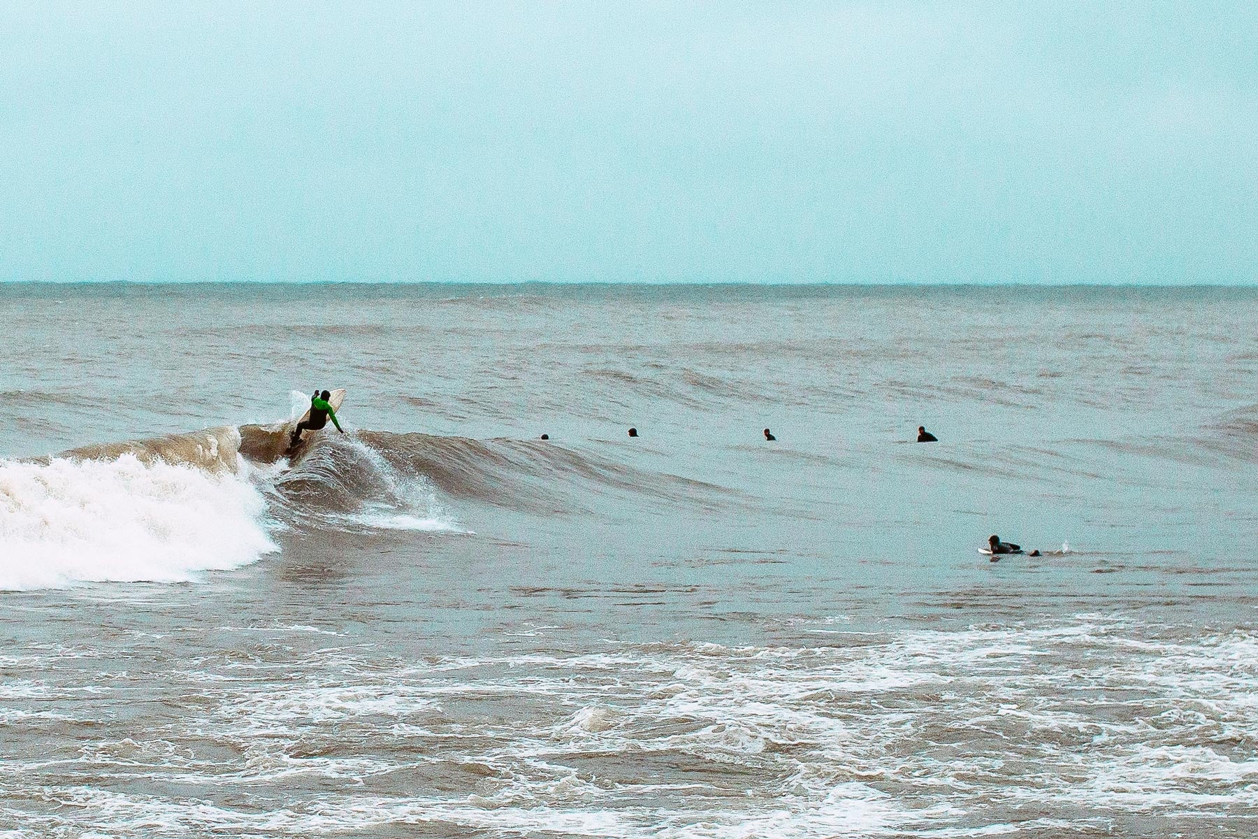 Larry Cavero surfing at The Cove in Toronto