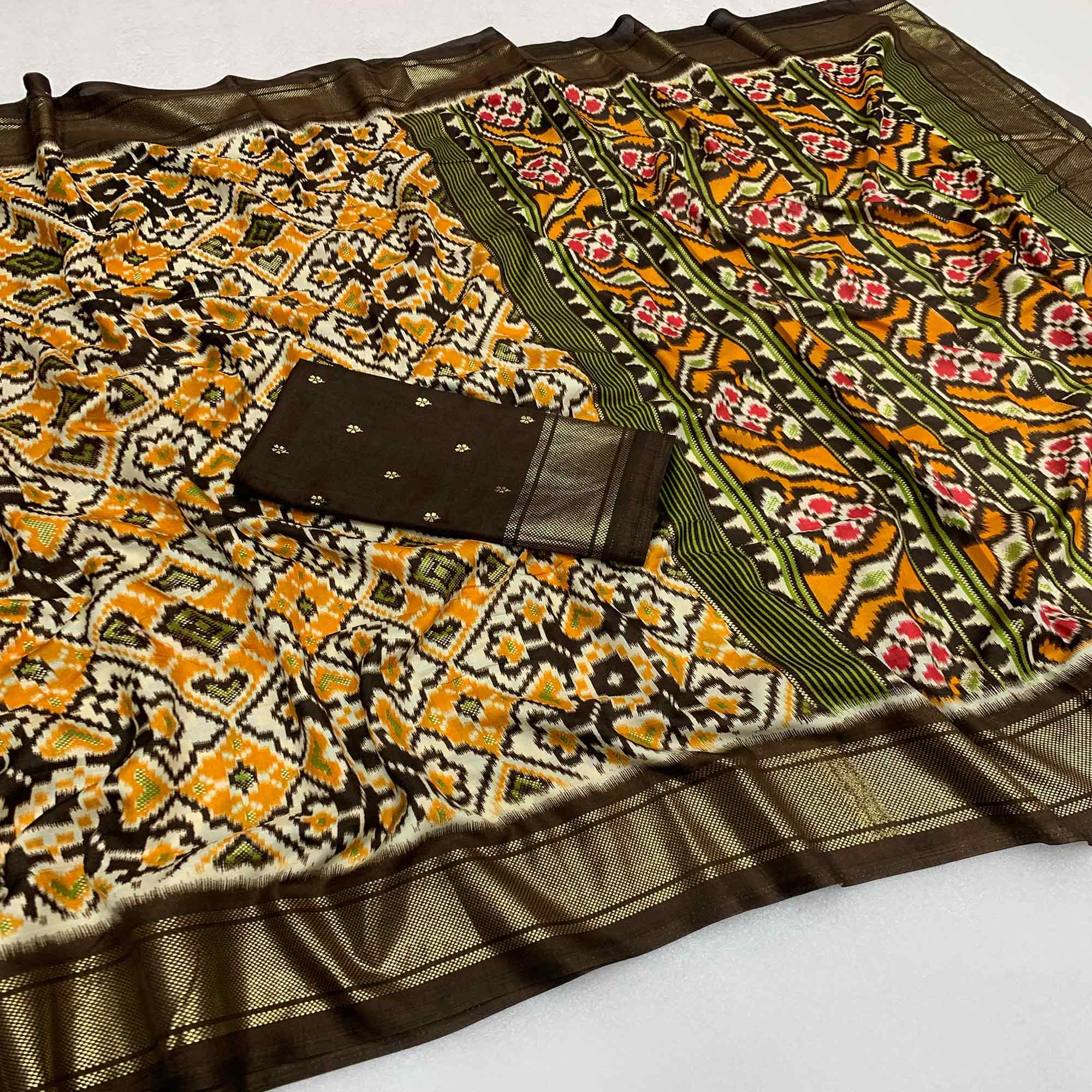 Beige Patola Printed Cotton Silk Saree With Tassels