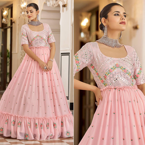 This cute cotton candy pink gown is designed with soft shiny sequins on  net. Style it with diamond earrings and now you a… | Gowns, Pink gowns,  Indian designer wear