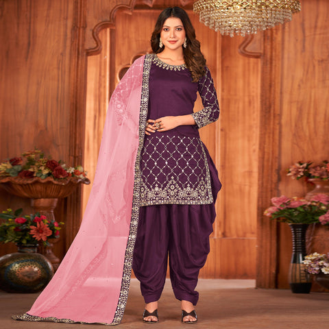 the desigirl printed bandhani suits and dress material in pure synthetics  cloth in beautiful patiyala suits
