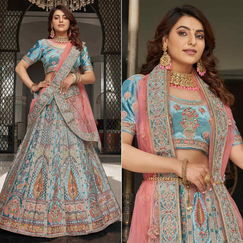 Staring Turquoise Blue Colored Party Wear Embroidered Silk Lehenga Choli