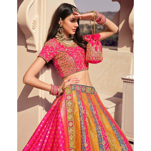 Unique Orange-Pink Colored Designer Embroidered Wedding Wear Tapeta-Raw  Silk Lehenga Saree