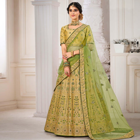 Pista Green Heavy Embroidered Netted Lehenga Choli