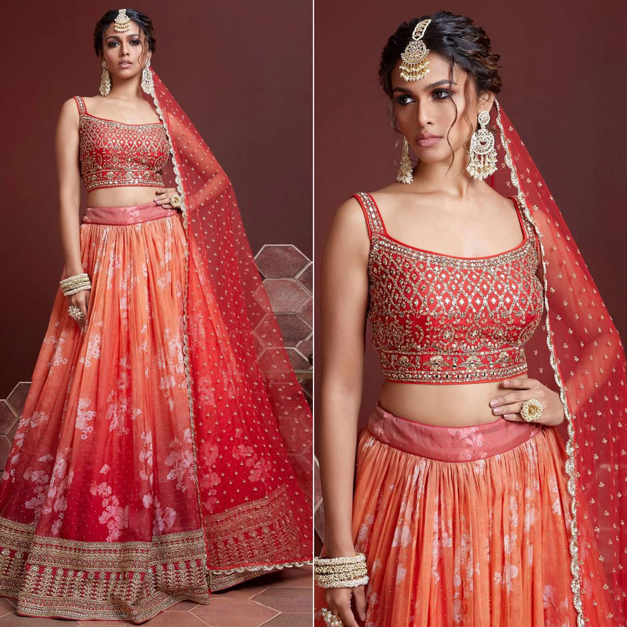 Amazing Peach Colored Partywear Embroidery Banarasi Silk Lehenga Choli