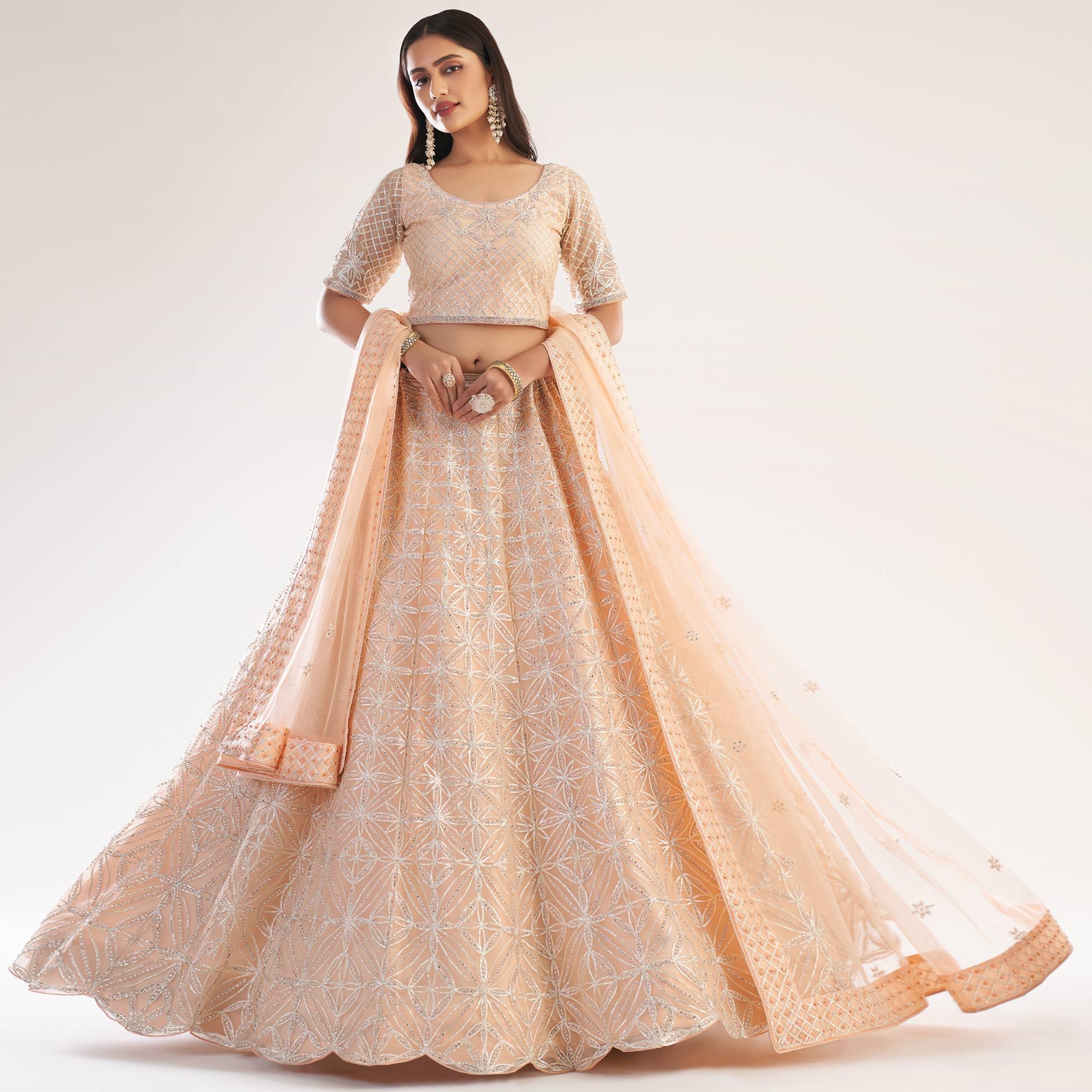 Amazing Peach Colored Partywear Embroidery Banarasi Silk Lehenga Choli