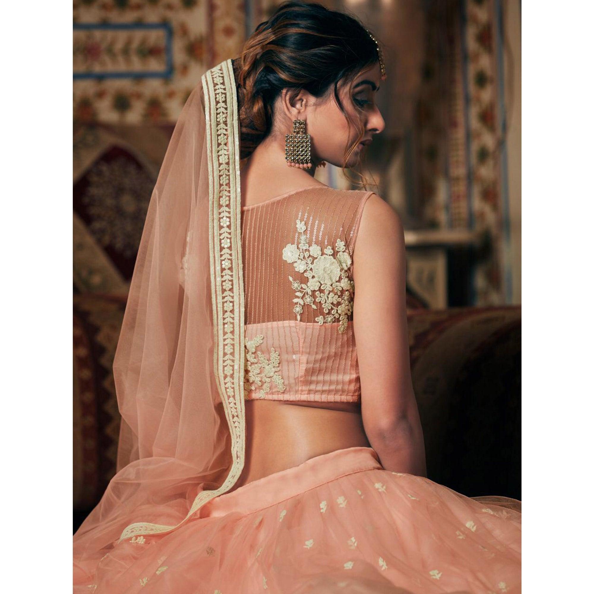 Peach Wedding Wear Floral Embroidery With Sequence And Dori Work Net Lehenga Choli 