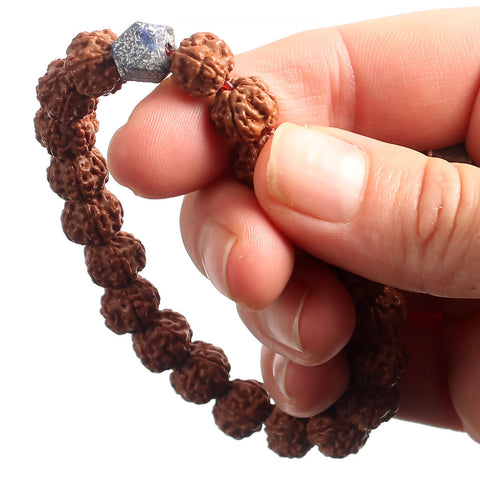 Rudraksha looped over fingers - Ready to start Practice at G-Bead