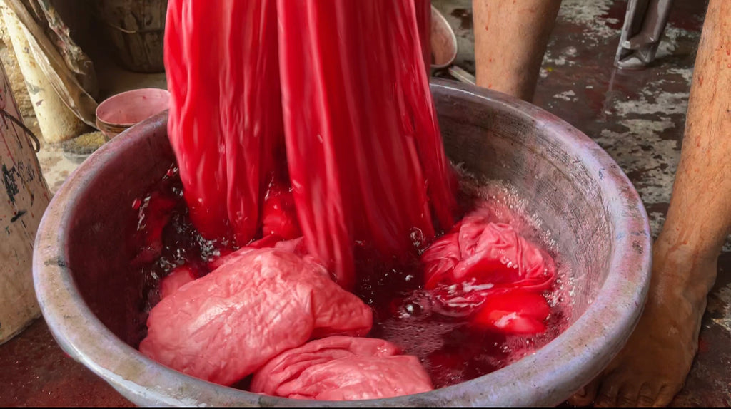 Hand dyeing the fabric at the cluster