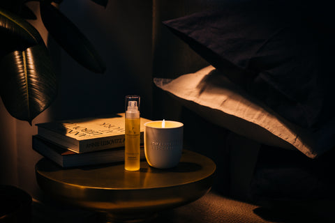 aromatherapy associates deep relax products on bedside table