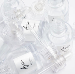 Arami Essentials refillable glass bottle