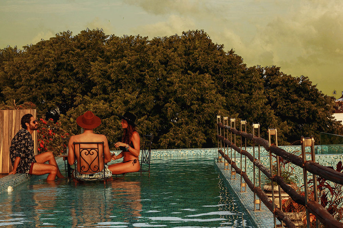 Friends enjoying the afternoon at the pool of BePlaya