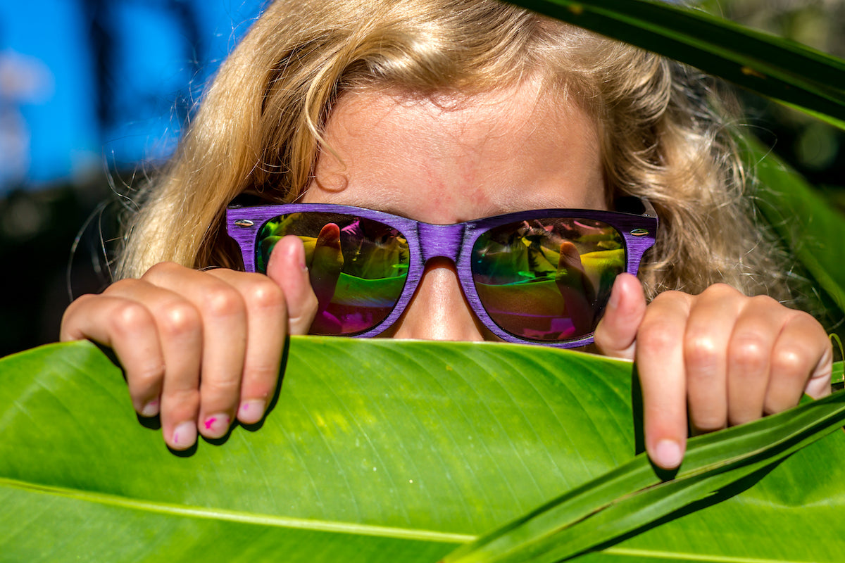 girl hiding leave