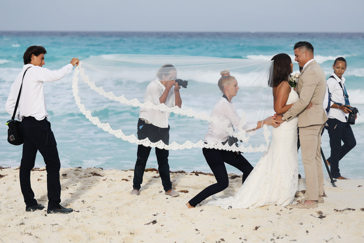 Photographers in action in a wedding in Cancun