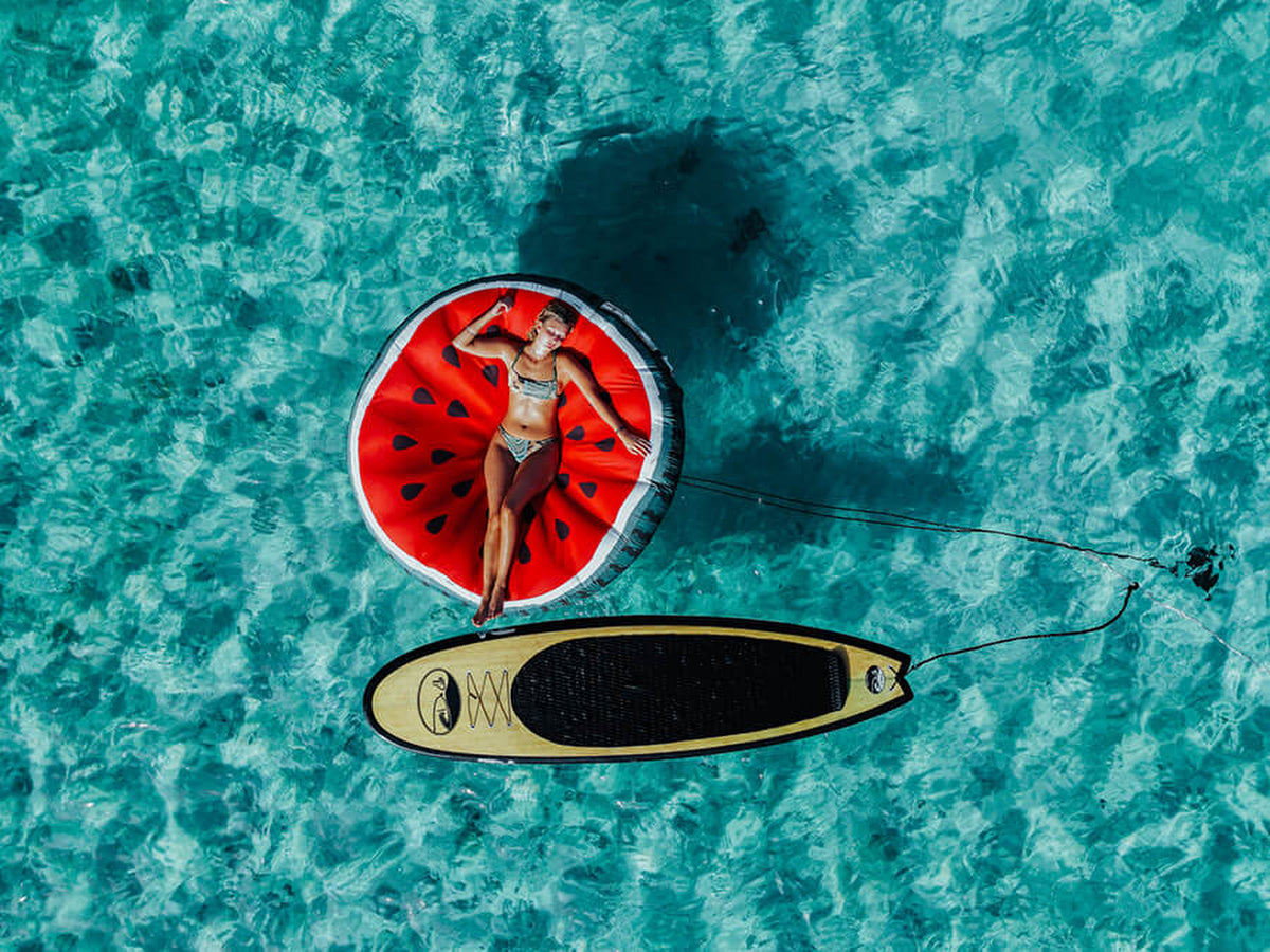 Drone photo of Liz over the float in El Cielo Cozumel