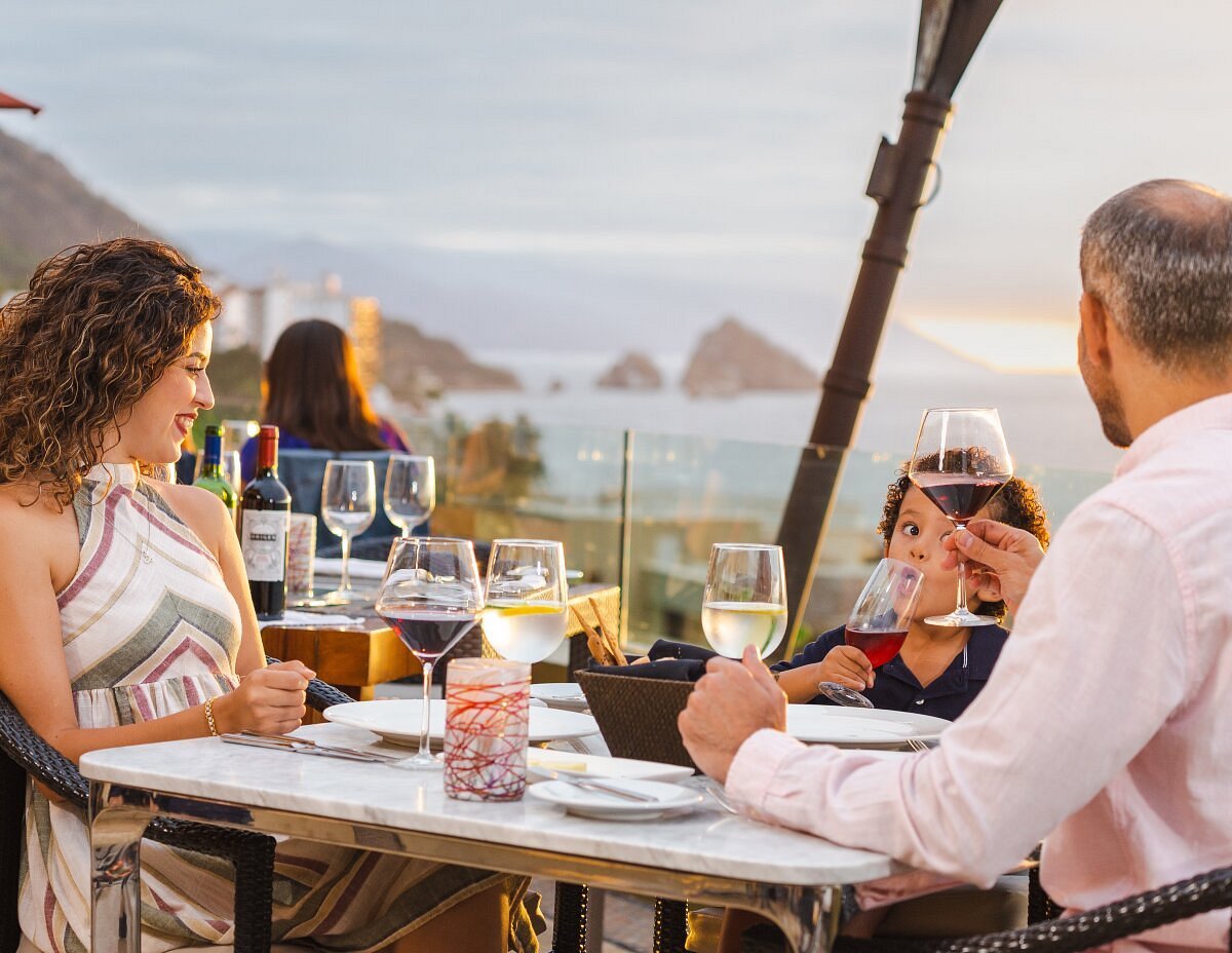 Guest enjoying dinner at Garza Blanca Vallarta