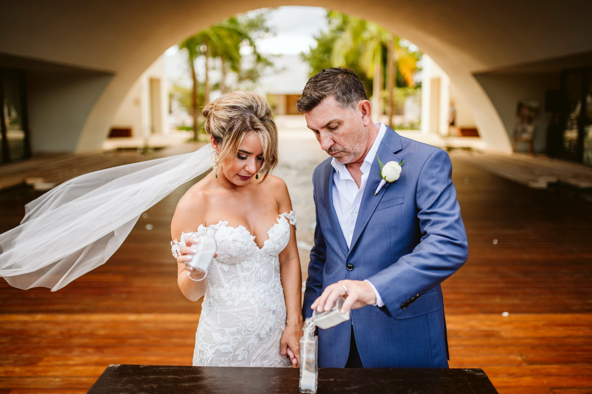 Couple in the wedding ceremony at Secrets Akumal