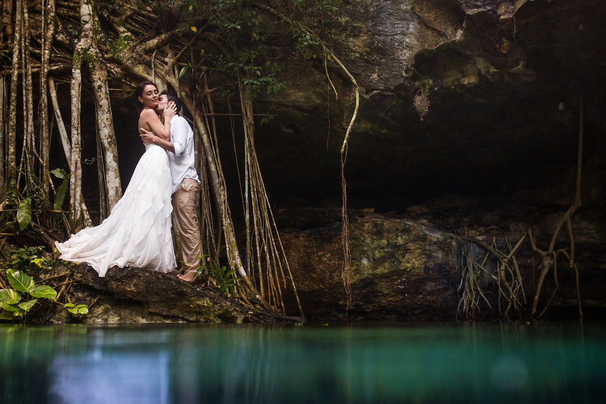 Clemence and Damian in a session trash the dress in a cenote