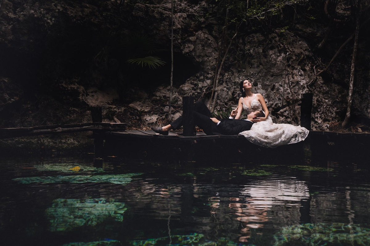 Beauty bride in a cave next to  the cenote