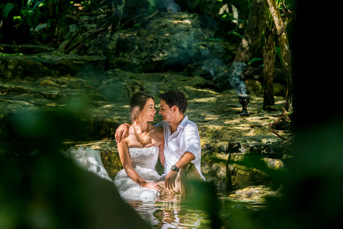 Clemence and Damian in a session trash the dress in a cenote